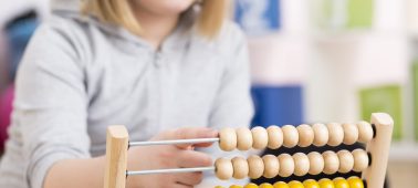 Girl using abacus